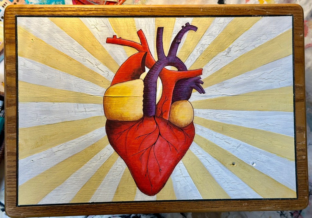Heart on top of the box, at the centre of everything
